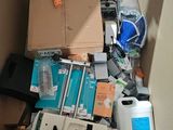 a cardboard box filled with assorted items in a room