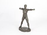 statue of a man holding a tennis racquet on a white background
