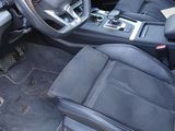 a picture of the inside of a car with the steering wheel down