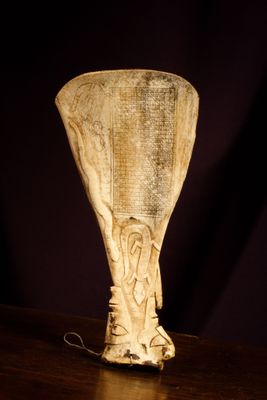 an image of a vase on a table with a black background
