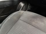 the interior of a car with the seat up and the front seat down