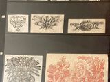 many different types of stamps on display in a glass case