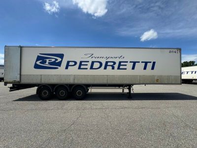 a semi truck that is parked in a parking lot