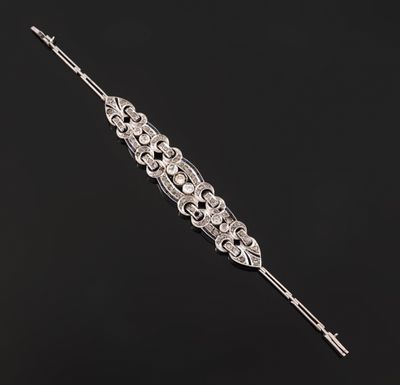 a diamond and platinum - plated hair comb