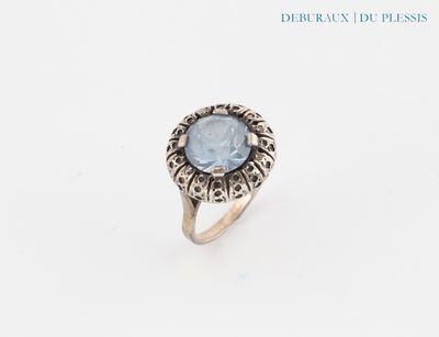 a close up of a ring with a stone in it