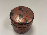 an image of a small wooden box with flowers on it