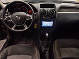 the interior of a car with a steering wheel, dashboard, and dashboard controls