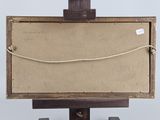a picture of a wooden easel with a piece of paper on top of it