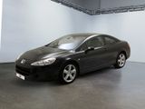 a picture of a black car in a white room