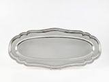 a silver plate with a decorative design on the edge