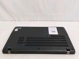an open laptop computer sitting on top of a white surface