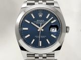 the blue dial on the rolex watch is very attractive