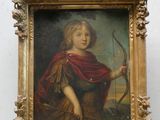portrait d'un jeune garçon tenant un arc et une flèche, dans un cadre doré