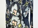 an image of a woman ' s sweater with a floral design on it