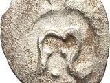 un gros plan d'une pièce de monnaie sur laquelle figure un cœur