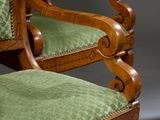 two chairs that are sitting next to each other