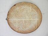 a picture of a piece of old newspaper on the wall