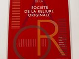 the cover of a book with a red cover and a red background