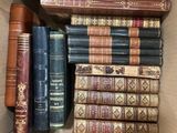 a box full of books that are sitting on a table