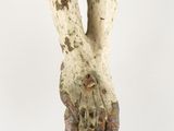 a close up of a statue of a person ' s feet and hands