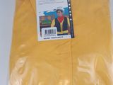 yellow t - shirt in plastic bag on white surface
