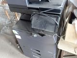 a pile of computer equipment sitting on top of each other
