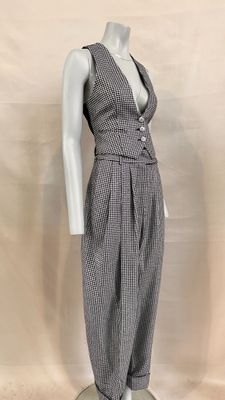 an image of a mannequin dress on a mannequin base