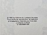the back cover of a book with a black and white image of a cat
