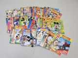 a lot of children ' s books that are on the table
