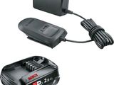 a black and decker battery charger next to a charger on a white background