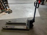 a pallet that is sitting in the middle of a garage