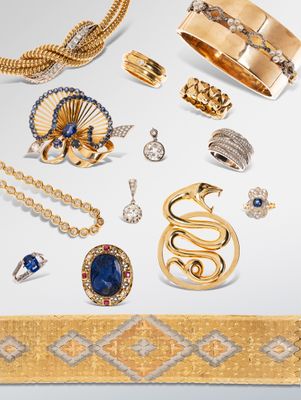 an assortment of gold jewelry including rings, bracelets, rings, and bracelets
