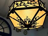 a light that is hanging from the ceiling in the room