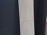 a radiator leaning against a wall in a room