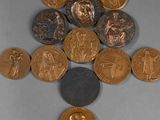 a cross made out of coins on a table