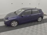 the blue car is parked in the garage on the checkered floor