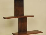 an image of a wooden shelf with three shelves