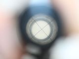 a blurry photo of a person holding a cell phone