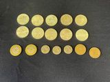 a close up of a pile of coins on top of a table