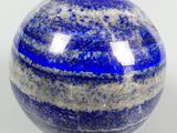 blue and white marble ball on a white background