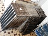 a pile of old wooden boards stacked on top of each other