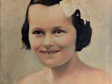 portrait of a young girl in a white dress with a flower in her hair