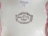 an image of a close up of a vase with a label on it
