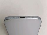 a close up of the back of a silver iphone with a white background