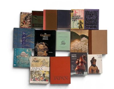 many books that are stacked on top of each other