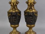 pair of antique bronze and marble vases on red marble bases