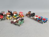 a lot of toy cars that are sitting on a table