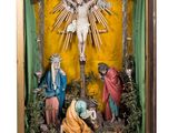 statue of the crucifix of jesus in a wooden case
