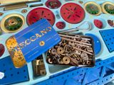 a blue box with a bunch of different types of buttons