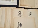 several old books with drawings on them sitting on a table